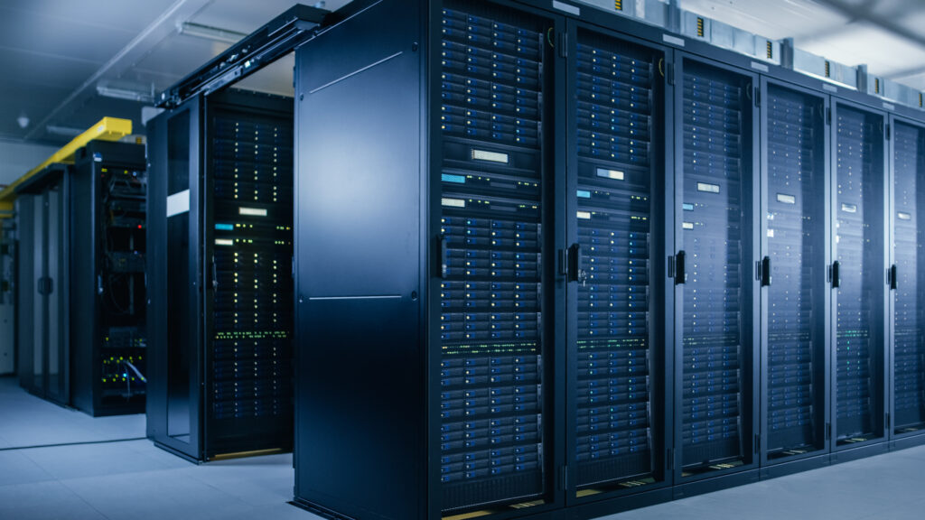Shot of Data Center With Multiple Rows of Fully Operational Server Racks. Modern Telecommunications, Cloud Computing, Artificial Intelligence, Database, Super Computer Technology Concept.