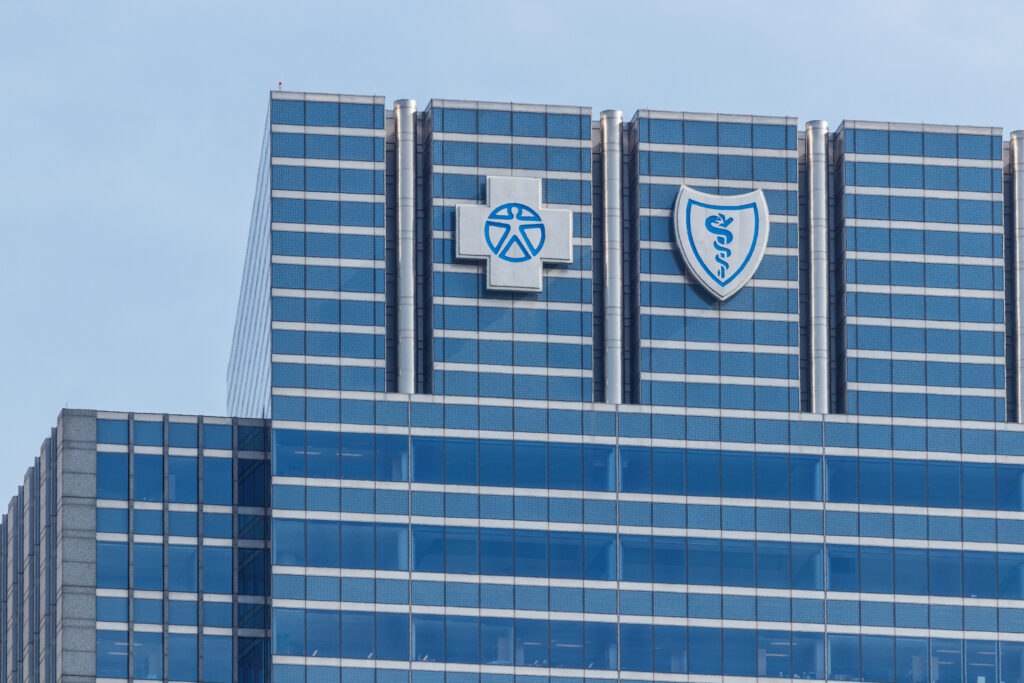 Chicago - Circa May 2018: Blue Cross Blue Shield headquarters signage and logo. Blue Cross Blue Shield is a federation of health insurance organizations I